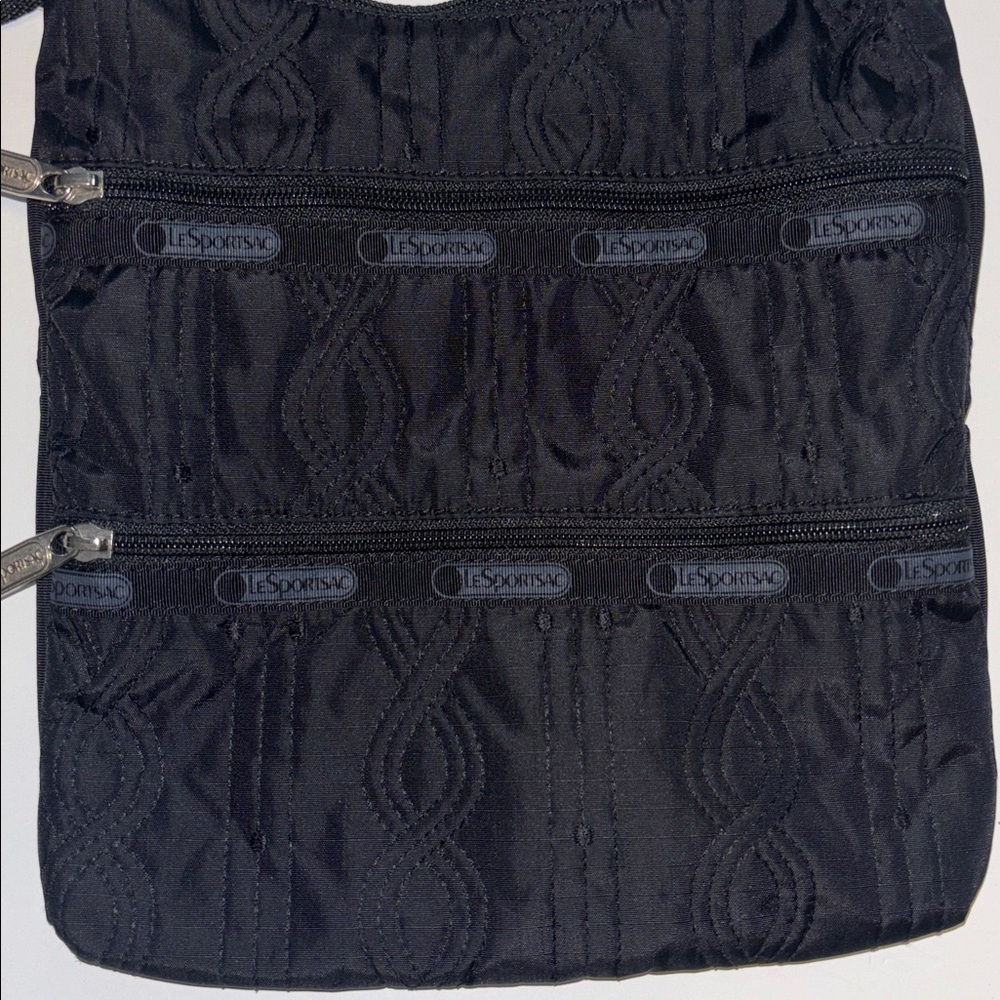 LESPORT SAC BLACK NYLON CROSSBODY BAG 2 ZIP POCKETS ON ONE SIDE ADJUSTABLE STRAP